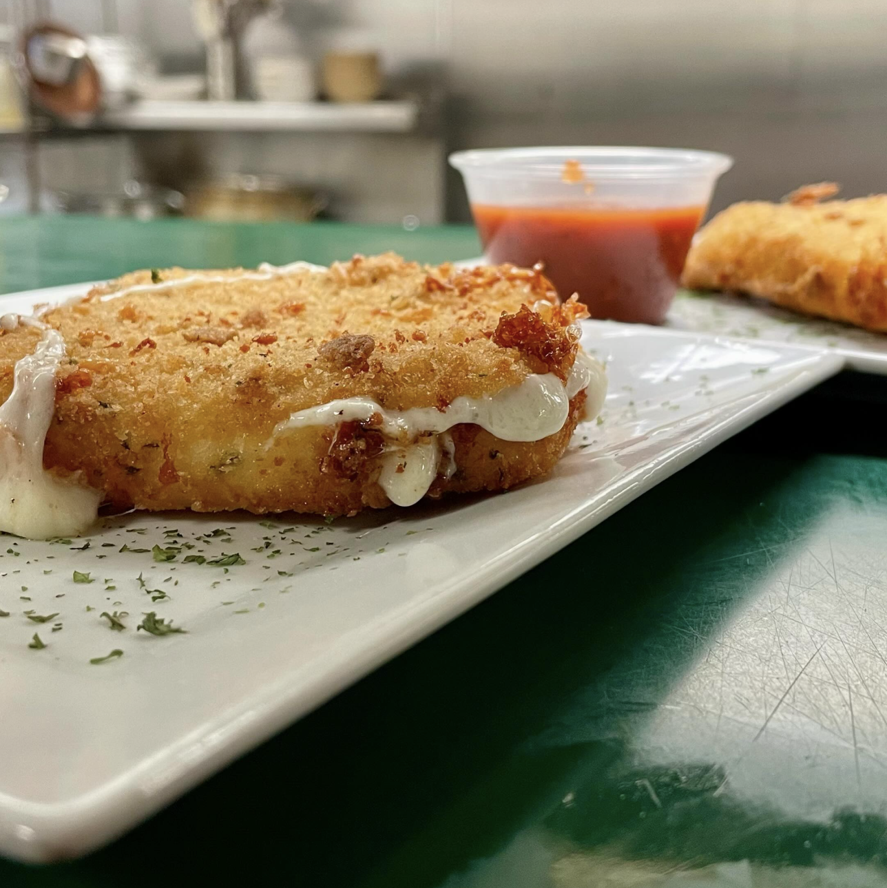 Breaded mozzarella with marinara dipping sauce